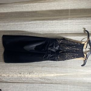 Stunning silk fitted sleeveless high neck dress